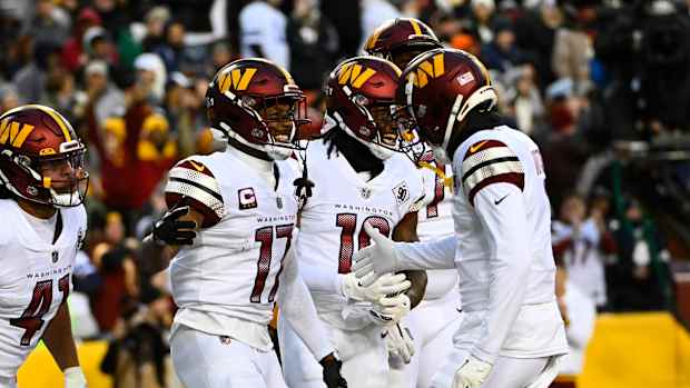 Washington Commanders receivers Terry McLaurin (17), Jahan Dotson (right), and Curtis Samuel (10)